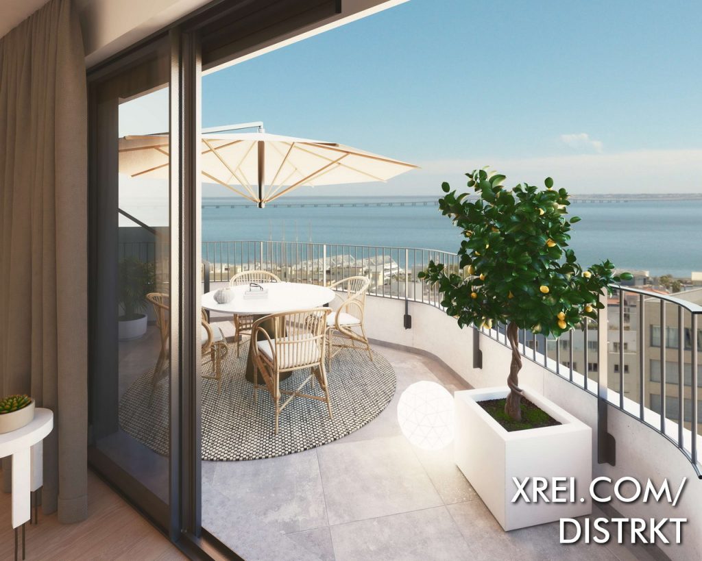 Distrikt terraços com vistas sobre a cidade e o rio Tejo.