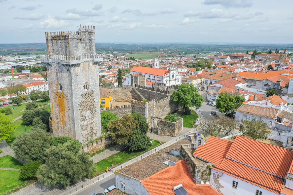Aerial view of the city of Beja, showing the walls of Beja Castle, Porta de Évora, the Cathedral, and the surrounding landscape